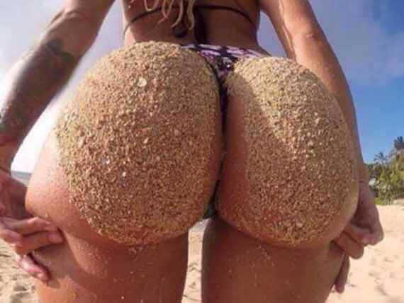 Hot ass covered in sand