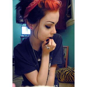 Scene girl with red hair and piercings