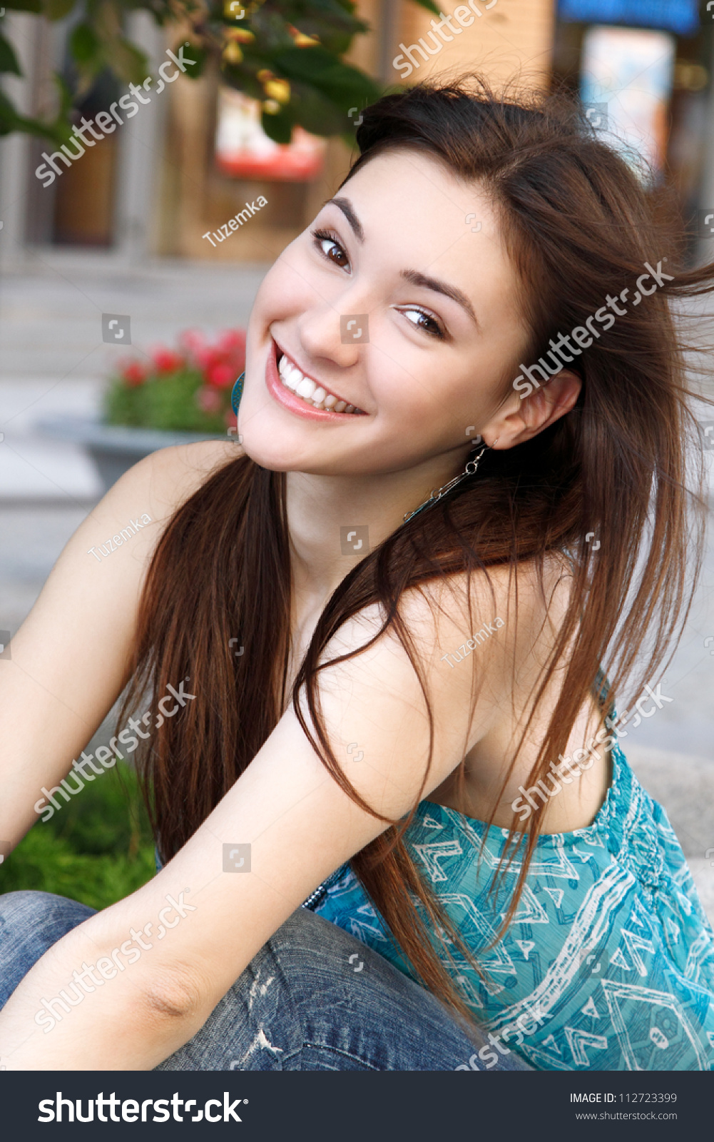 Young brunette teen outdoors
