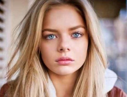 Girl with blonde hair green eyes