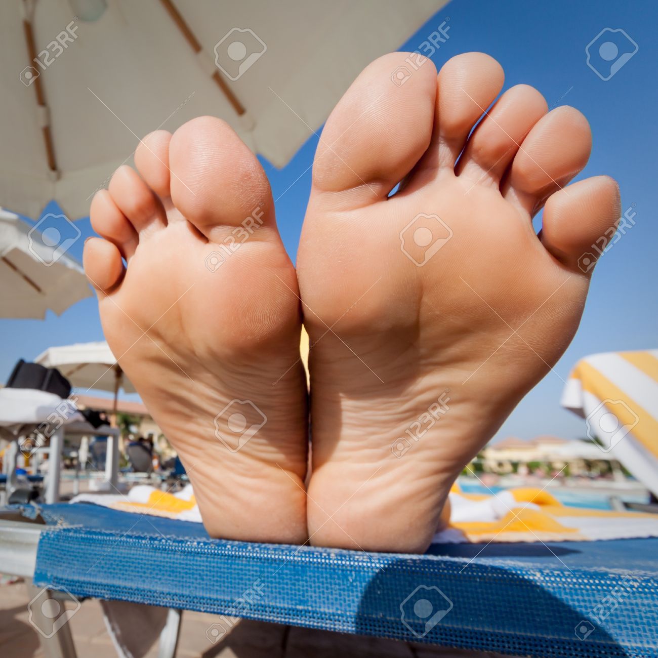 Girl feet soles up close