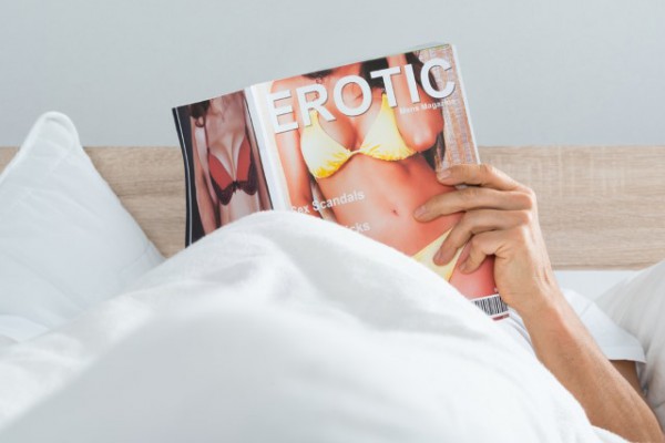 Guys reading porn magazine