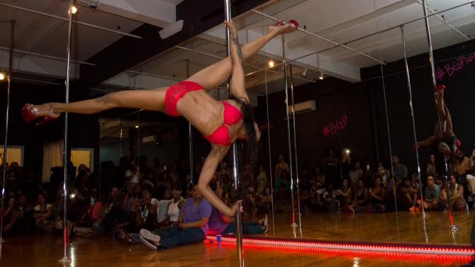 Girl on stripper pole