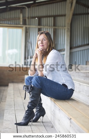 Mature women wearing only boots